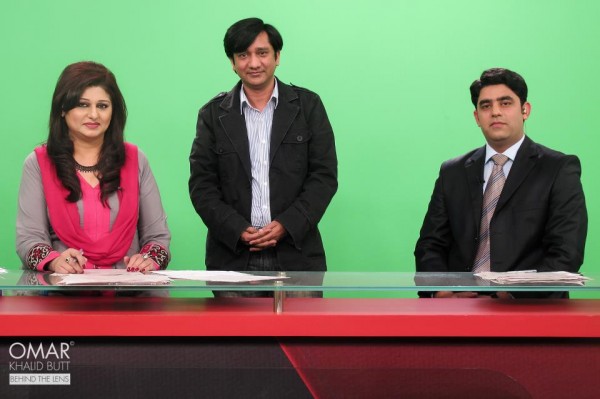 Shabnam Riaz and Basit Rehman pose with the Producer Hamid Sheikh on set.